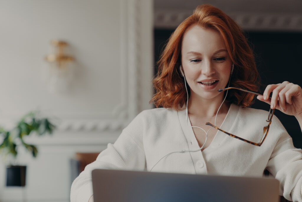 Woman thinking about which agency to hire for her business