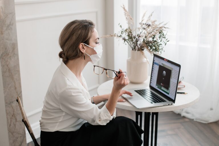 business-your-woman-in-mask-is-working-at-cozy-office